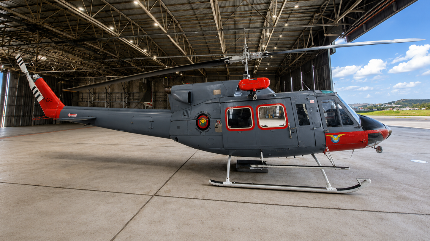 Right side image of a Bell 212 helicopter for sale in Papua New Guinea.